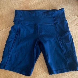 Lululemon 8” navy shorts with pockets, size 8
